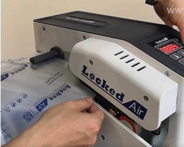 step-by-step-guide-how-to-properly-load-air-cushion-film-into-your-lockedair-air-cushion-machine-4.jpg